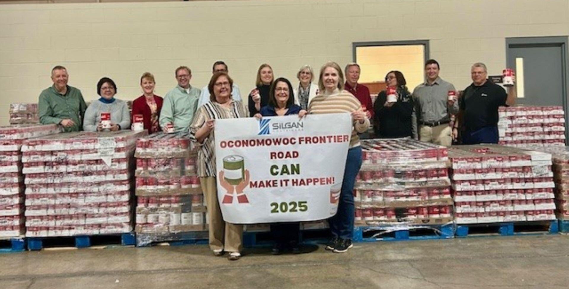 Silgan employees with donation of canned soup